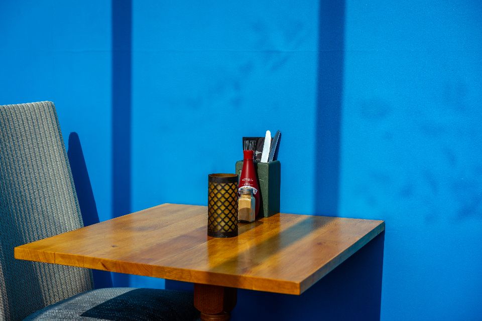 The cafe counter with stools alongside